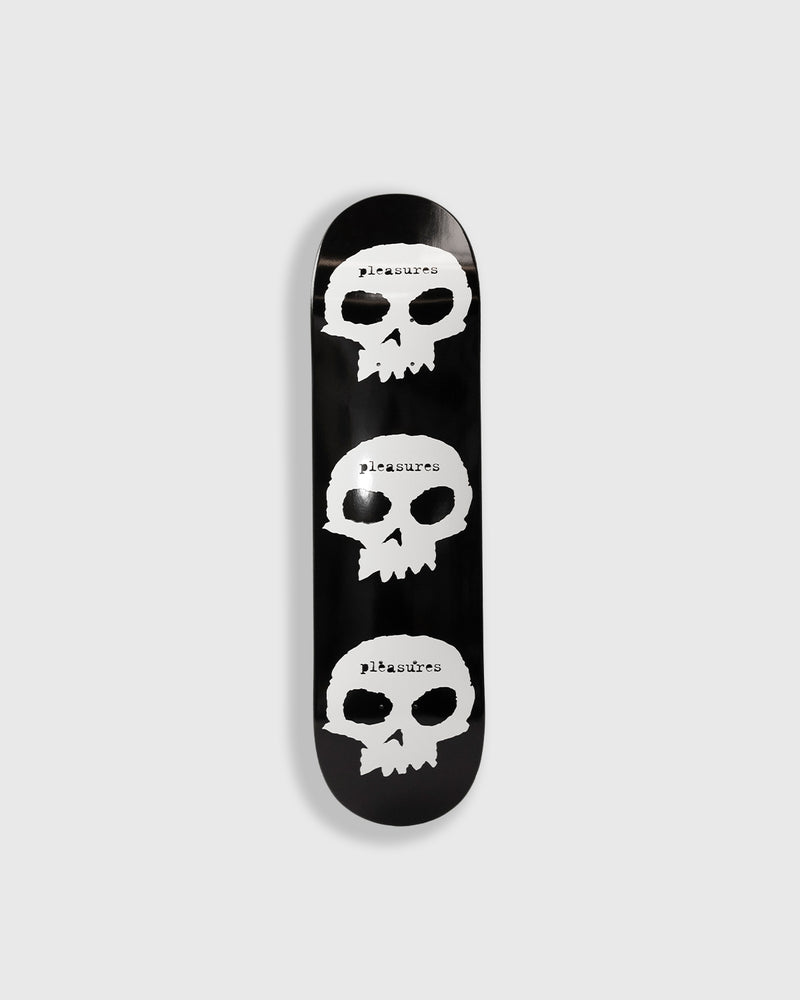 PLEASURES SKULLS SKATE DECK